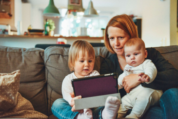 Family reading on couch